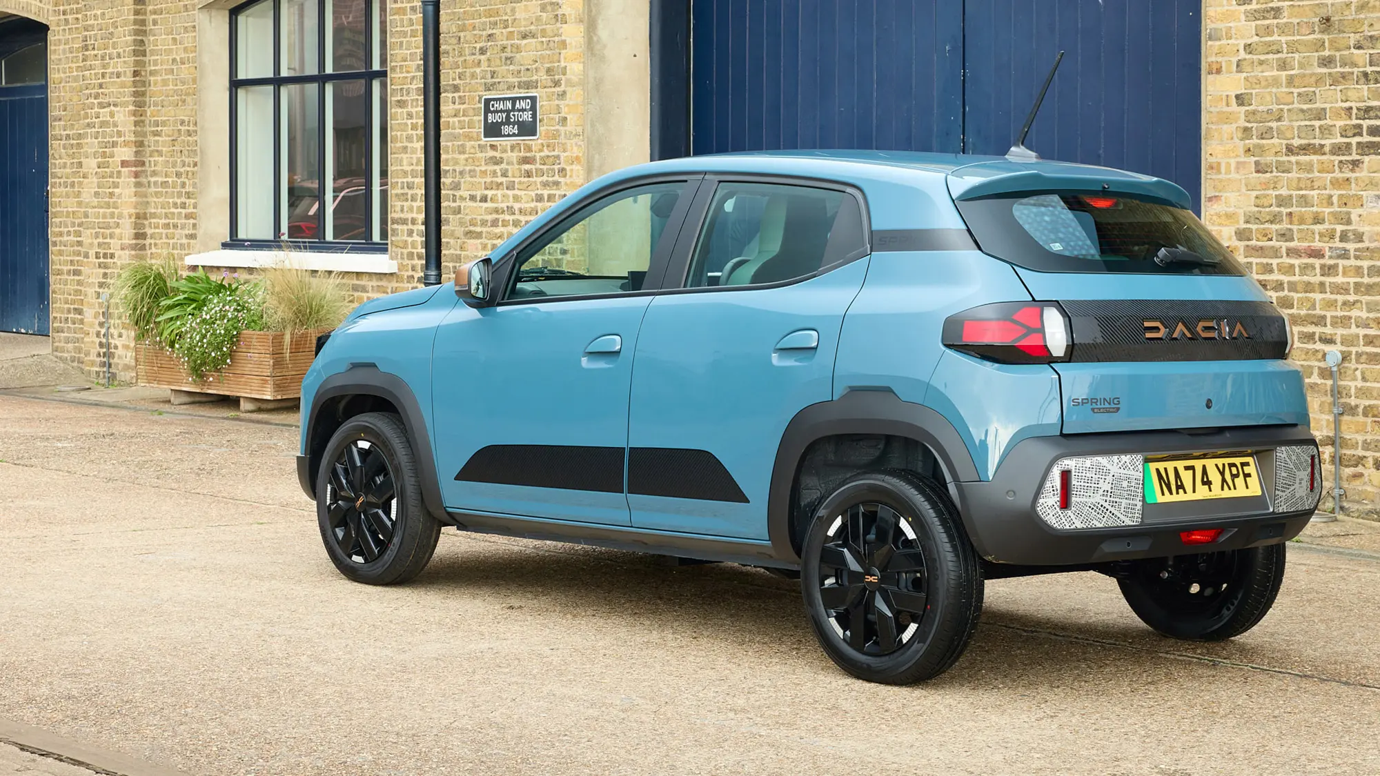 076 dacia spring review rear blue